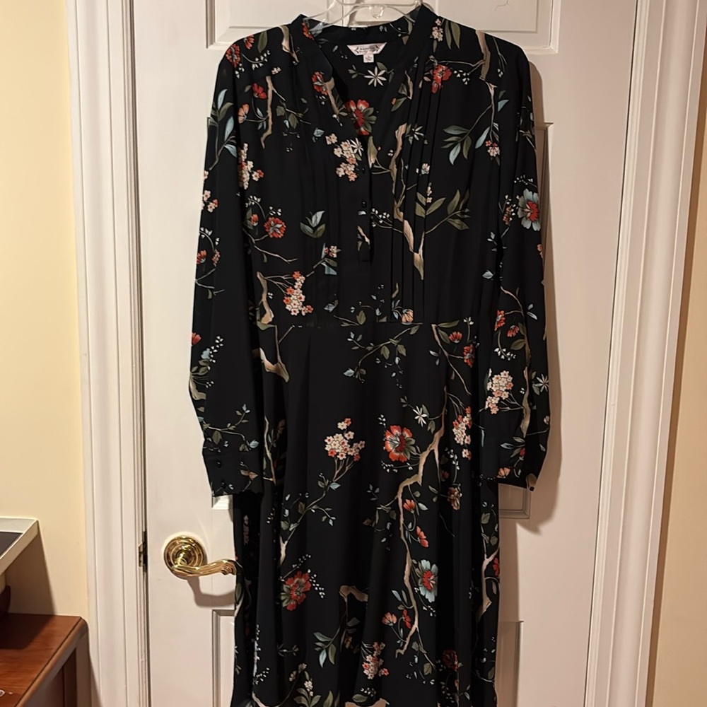 A Floral NANETTE LEPORE DRESS with long sleeve . Size 10